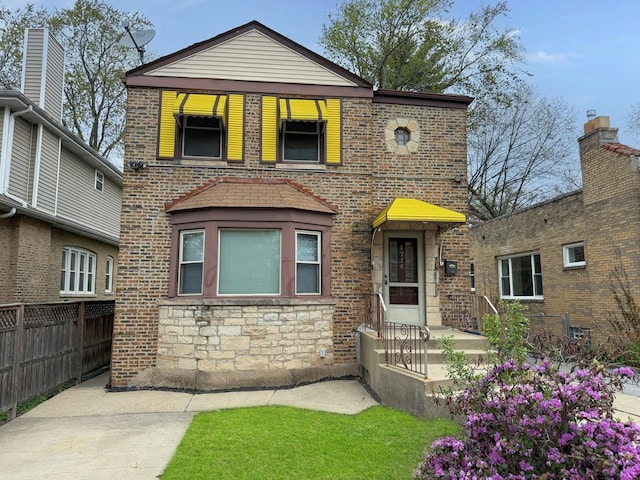1714 W Beverly Glen Pkwy, Chicago, IL 60643 - view of front of property featuring brick siding, fence, and stone siding