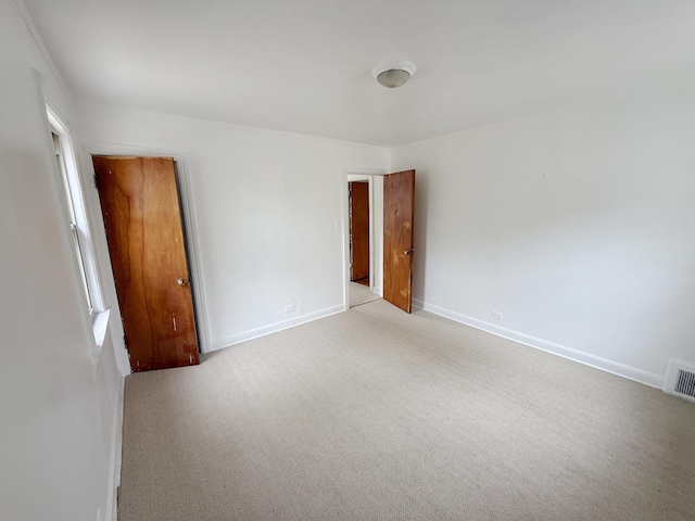 1714 W Beverly Glen Pkwy, Chicago, IL 60643 - carpeted spare room featuring baseboards and visible vents