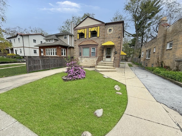 1714 W Beverly Glen Pkwy, Chicago, IL 60643 - view of front of house with fence, driveway, and a front lawn