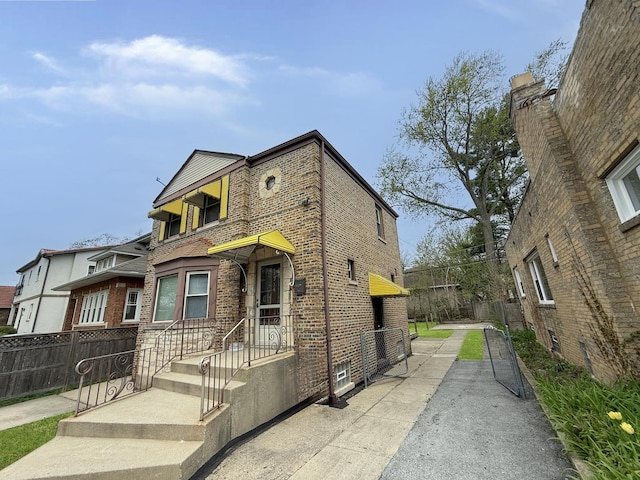 1714 W Beverly Glen Pkwy, Chicago, IL 60643 - view of front of property featuring fence and brick siding