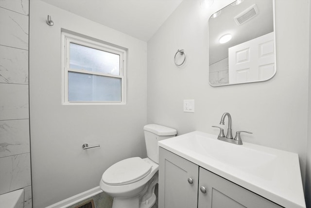 full bath featuring walk in shower, vanity, toilet, baseboards, and visible vents