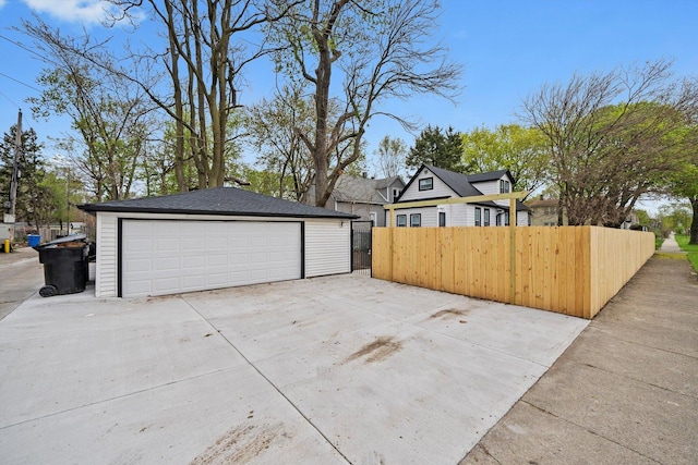 detached garage with fence