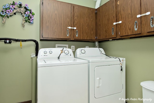 laundry area featuring cabinet space and independent washer and dryer