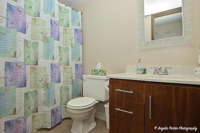 full bath featuring toilet, tile patterned floors, and vanity