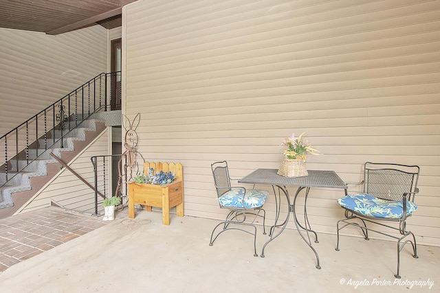 view of patio / terrace featuring stairs
