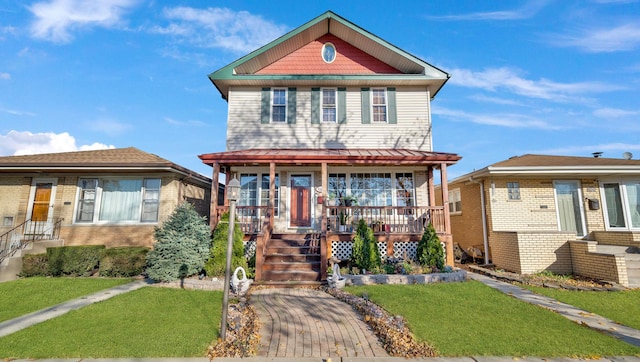 7022 W 64th St, Chicago, IL 60638 - view of front of property with a front lawn, covered porch, and brick siding