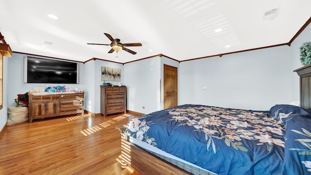7022 W 64th St, Chicago, IL 60638 - bedroom with wood finished floors, ceiling fan, recessed lighting, and ornamental molding