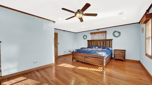 7022 W 64th St, Chicago, IL 60638 - bedroom with baseboards, ornamental molding, and light wood-style floors