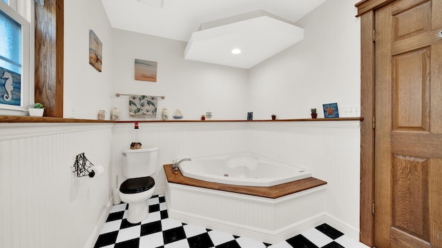 7022 W 64th St, Chicago, IL 60638 - full bath with tile patterned floors, a wainscoted wall, toilet, and a jetted tub