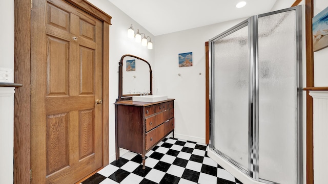 7022 W 64th St, Chicago, IL 60638 - bathroom featuring vanity, a shower stall, and tile patterned floors