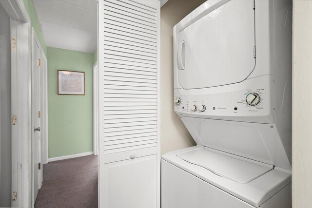 2345 185th Ct Unit 1, Lansing, IL 60438 - clothes washing area with stacked washer / drying machine, carpet floors, and baseboards