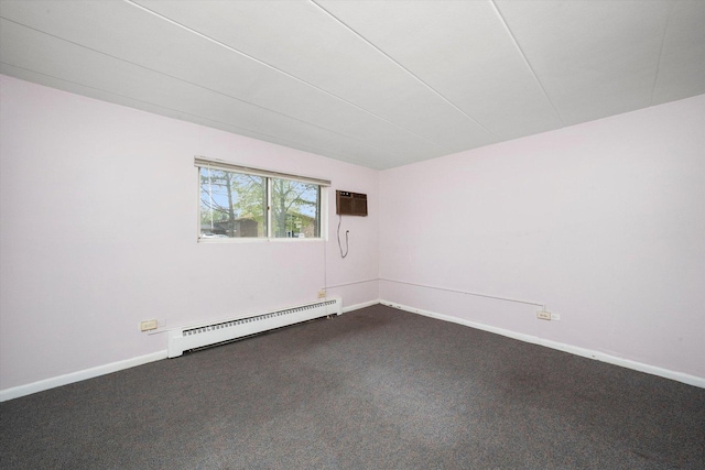 empty room featuring dark colored carpet, a baseboard radiator, and baseboards
