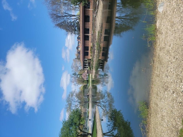 exterior space with a water view