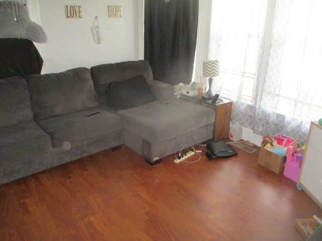 living room with wood finished floors