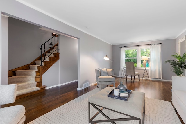 2011 Brentwood Rd, Northbrook, IL 60062 - living area featuring wood finished floors, stairway, ornamental molding, and baseboards