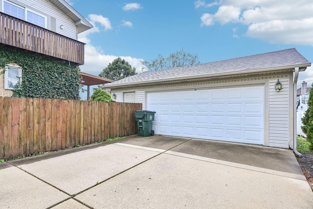 detached garage with fence