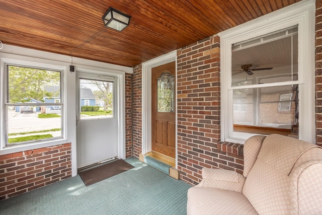 doorway to property featuring covered porch