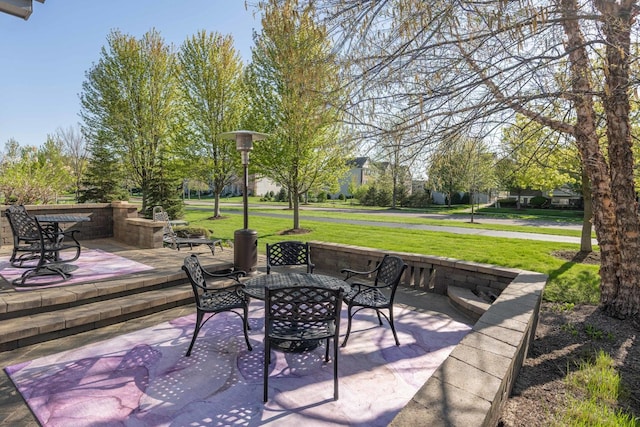 825 Canton Dr, Oswego, IL 60543 - view of patio featuring outdoor dining space
