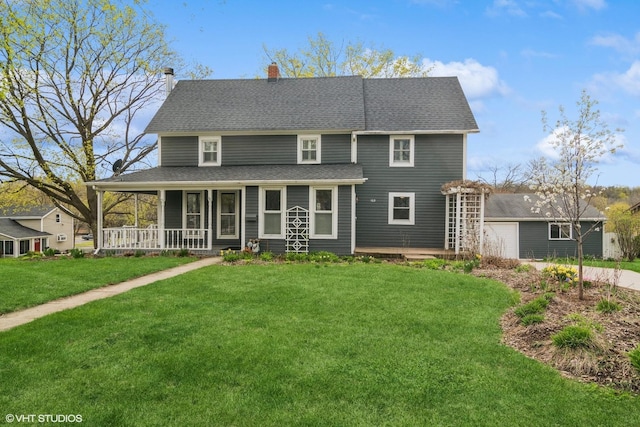 view of front of property featuring a garage, a front yard, a chimney, concrete driveway, and covered porch