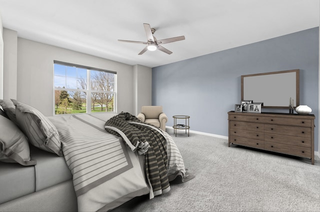 carpeted bedroom featuring a ceiling fan and baseboards
