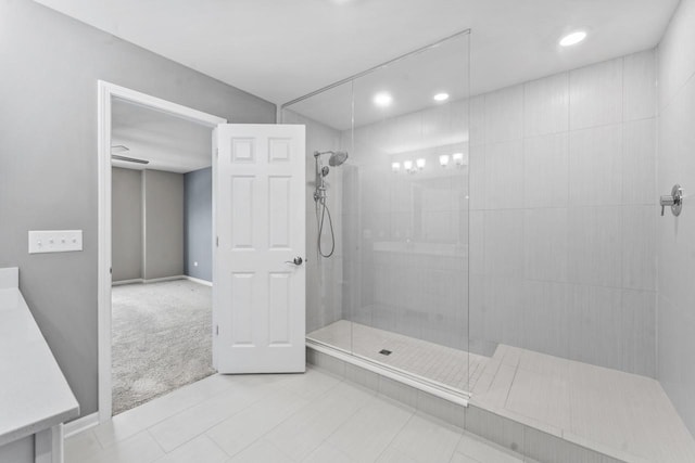 full bath with vanity, recessed lighting, walk in shower, and tile patterned flooring