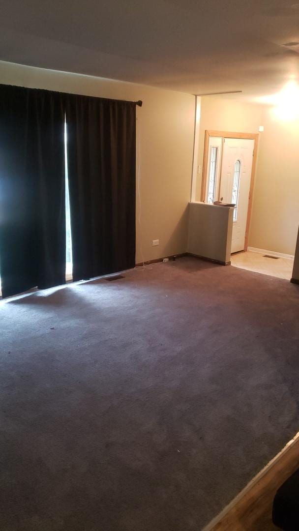 5326 Yale Ln, Matteson, IL 60443 - empty room featuring carpet flooring and baseboards