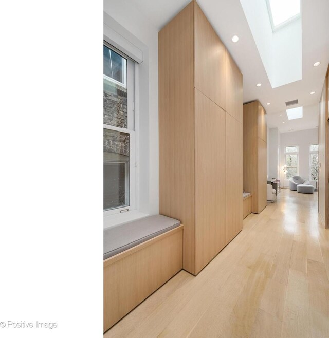 1833 W Evergreen Ave, Chicago, IL 60622 - hall featuring recessed lighting, a skylight, visible vents, and light wood-style flooring