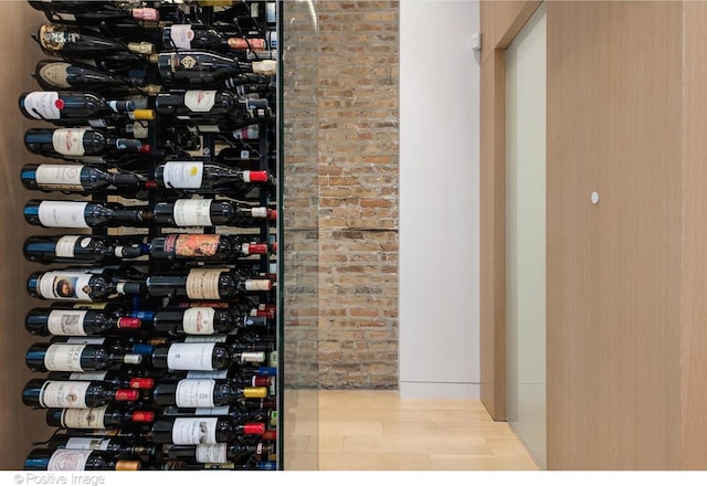 1833 W Evergreen Ave, Chicago, IL 60622 - wine cellar with wood finished floors and brick wall