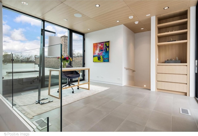 1833 W Evergreen Ave, Chicago, IL 60622 - home office featuring visible vents, floor to ceiling windows, baseboards, and built in shelves