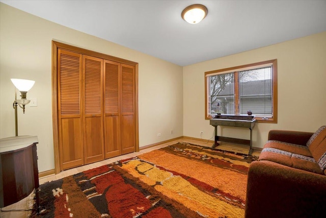 sitting room featuring baseboards