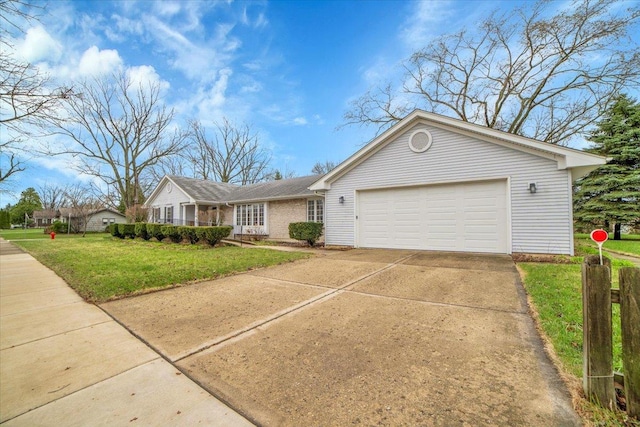 single story home featuring a garage, driveway, a front lawn, and brick siding