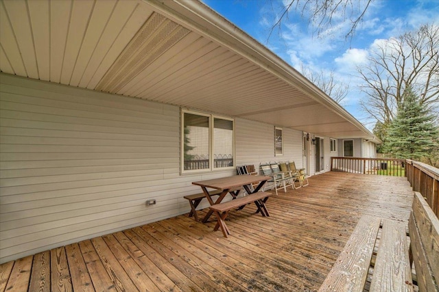 deck featuring outdoor dining space