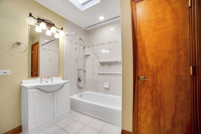 full bathroom with shower / bathtub combination, tile patterned floors, a skylight, and vanity