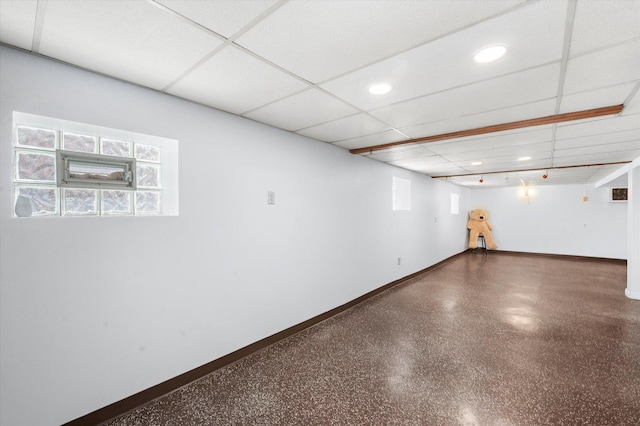3517 S 59th Ave, Cicero, IL 60804 - spare room with baseboards, healthy amount of natural light, speckled floor, and a paneled ceiling