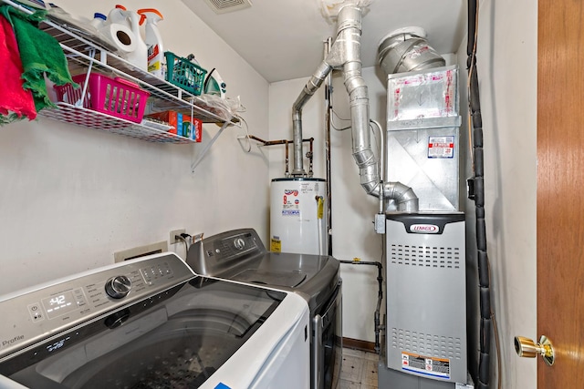 14004 Whipple St, Blue Island, IL 60406 - laundry area with laundry area, water heater, washing machine and dryer, and visible vents