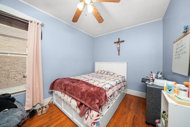 1314 S 59th Ct, Cicero, IL 60804 - bedroom with crown molding, baseboards, ceiling fan, and wood finished floors