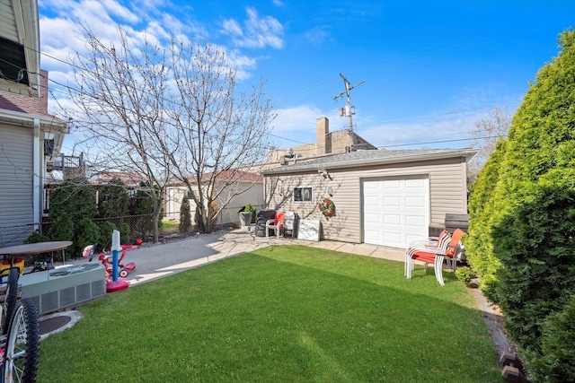 1314 S 59th Ct, Cicero, IL 60804 - back of property with a lawn, a chimney, a patio area, and fence