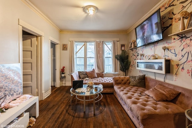 living room with baseboards, ornamental molding, and wood finished floors