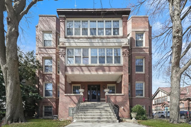 multi unit property featuring brick siding