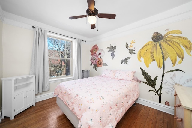 bedroom featuring dark wood-style floors, baseboards, and ceiling fan