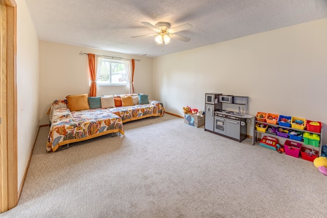 750 Evergreen Ln, Bartlett, IL 60103 - playroom featuring carpet, a ceiling fan, a textured ceiling, and baseboards