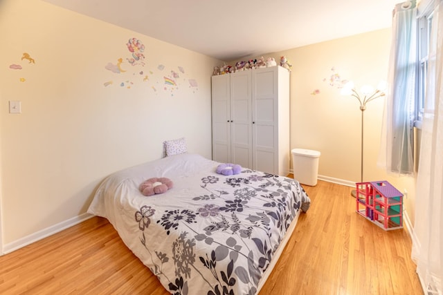 750 Evergreen Ln, Bartlett, IL 60103 - bedroom featuring light wood-style flooring and baseboards