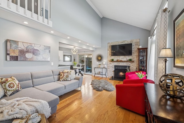 1352 N Knollwood Dr, Palatine, IL 60067 - living area with wood finished floors, a stone fireplace, and high vaulted ceiling