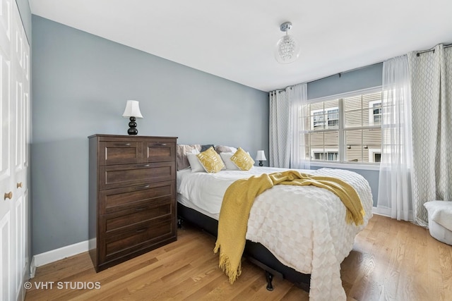 1352 N Knollwood Dr, Palatine, IL 60067 - bedroom featuring light wood-style flooring and baseboards
