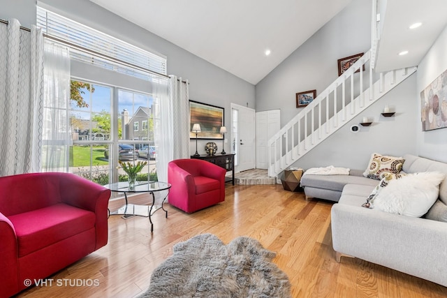 1352 N Knollwood Dr, Palatine, IL 60067 - living area with stairway, high vaulted ceiling, wood finished floors, and recessed lighting