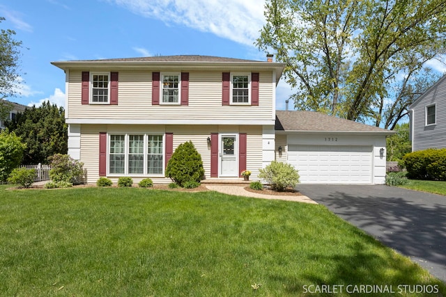1712 La Palma Ct, Wheaton, IL 60189 - colonial home with driveway, an attached garage, a front yard, and a chimney