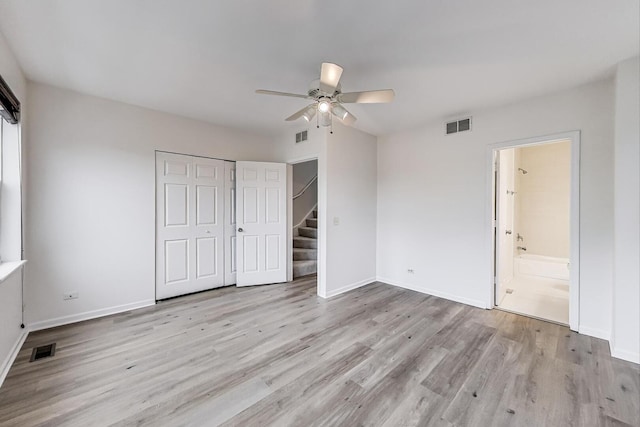 5350 N Damen Ave Unit F, Chicago, IL 60625 - unfurnished bedroom with baseboards, wood finished floors, and visible vents