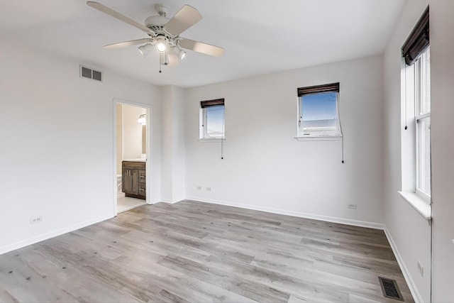 5350 N Damen Ave Unit F, Chicago, IL 60625 - unfurnished room featuring ceiling fan, light wood-type flooring, and visible vents