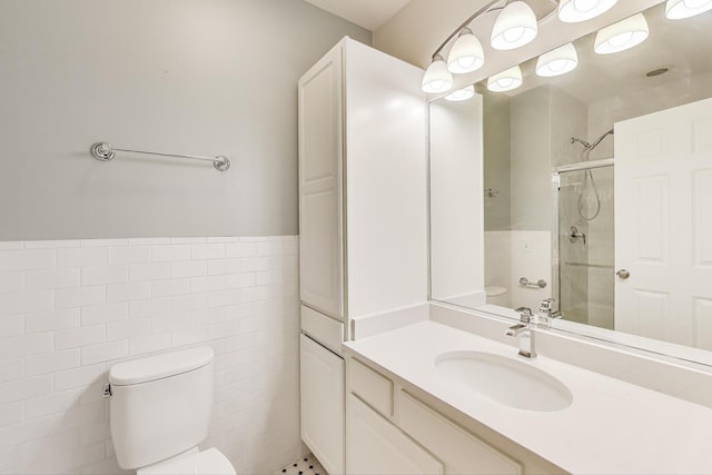 5350 N Damen Ave Unit F, Chicago, IL 60625 - bathroom with vanity, tile walls, a shower with door, and toilet