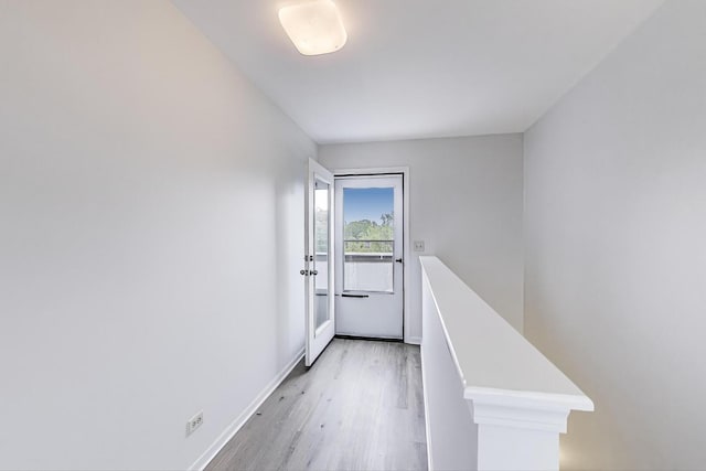 5350 N Damen Ave Unit F, Chicago, IL 60625 - doorway featuring baseboards and light wood-style flooring